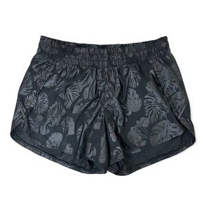 Athleta Black Tropical Leaves Print Racer Run Athletic Shorts Medium 4.5” Inseam